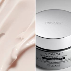 Close-up of Oriflame NovAge+ Multi-Active Anti-Ageing Night Cream Rich with a smooth cream texture displayed beside the premium silver skincare jar.